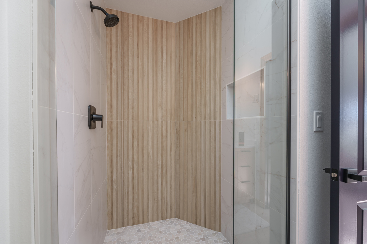Full bathroom with stand up shower located in the main living area