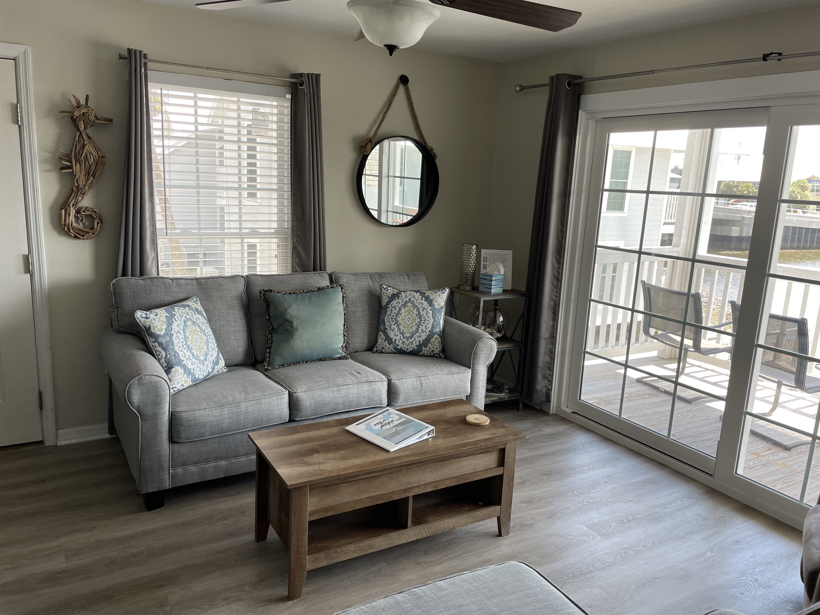 Living Area and Sliders to Private Deck