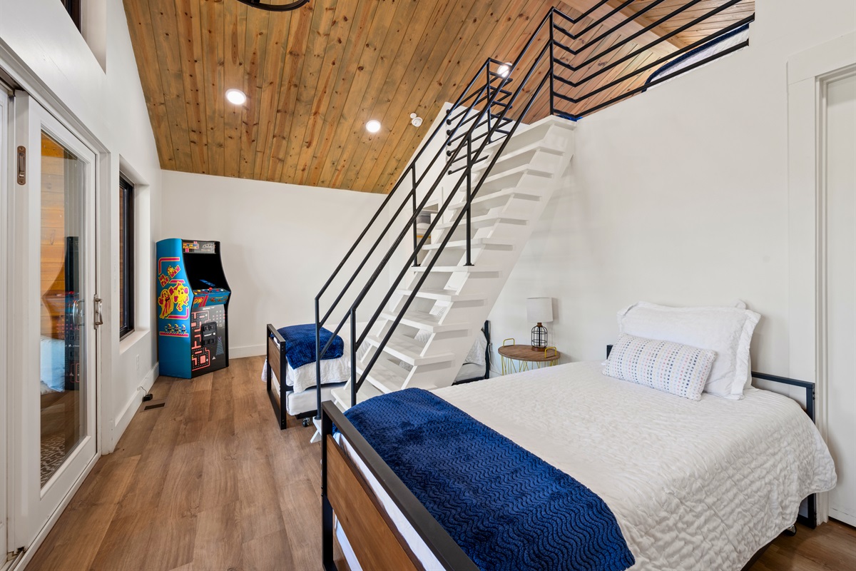 From another angle, you can see just how spacious and open this sleeping area feels, with plenty of room to move around comfortably.