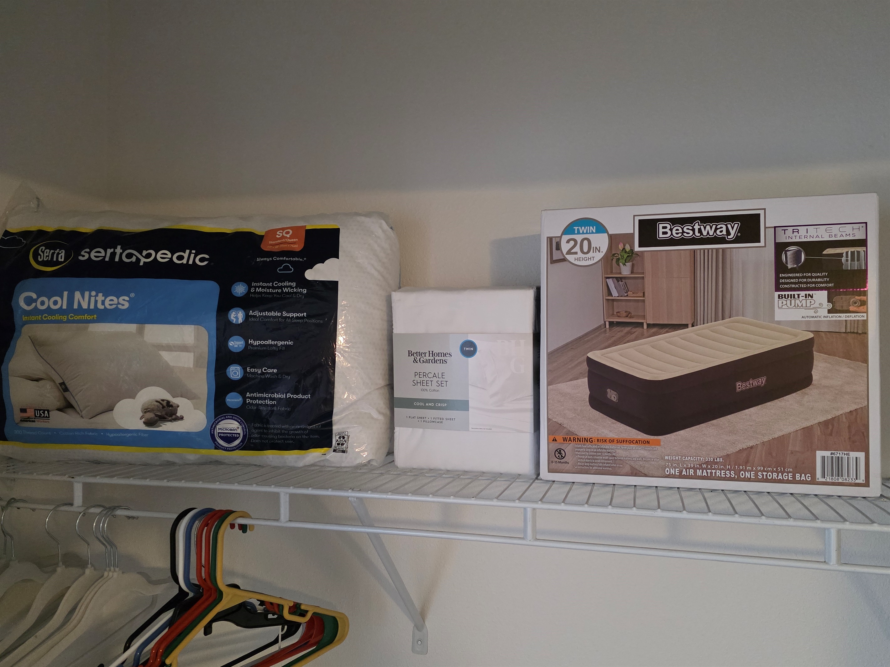 Extra blow up twin bed with linens