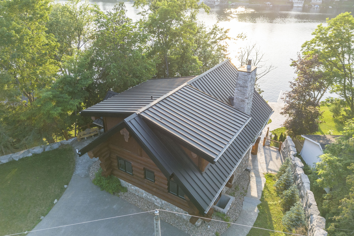 Elevated aerial view of Bear Lodge and its wooded setting