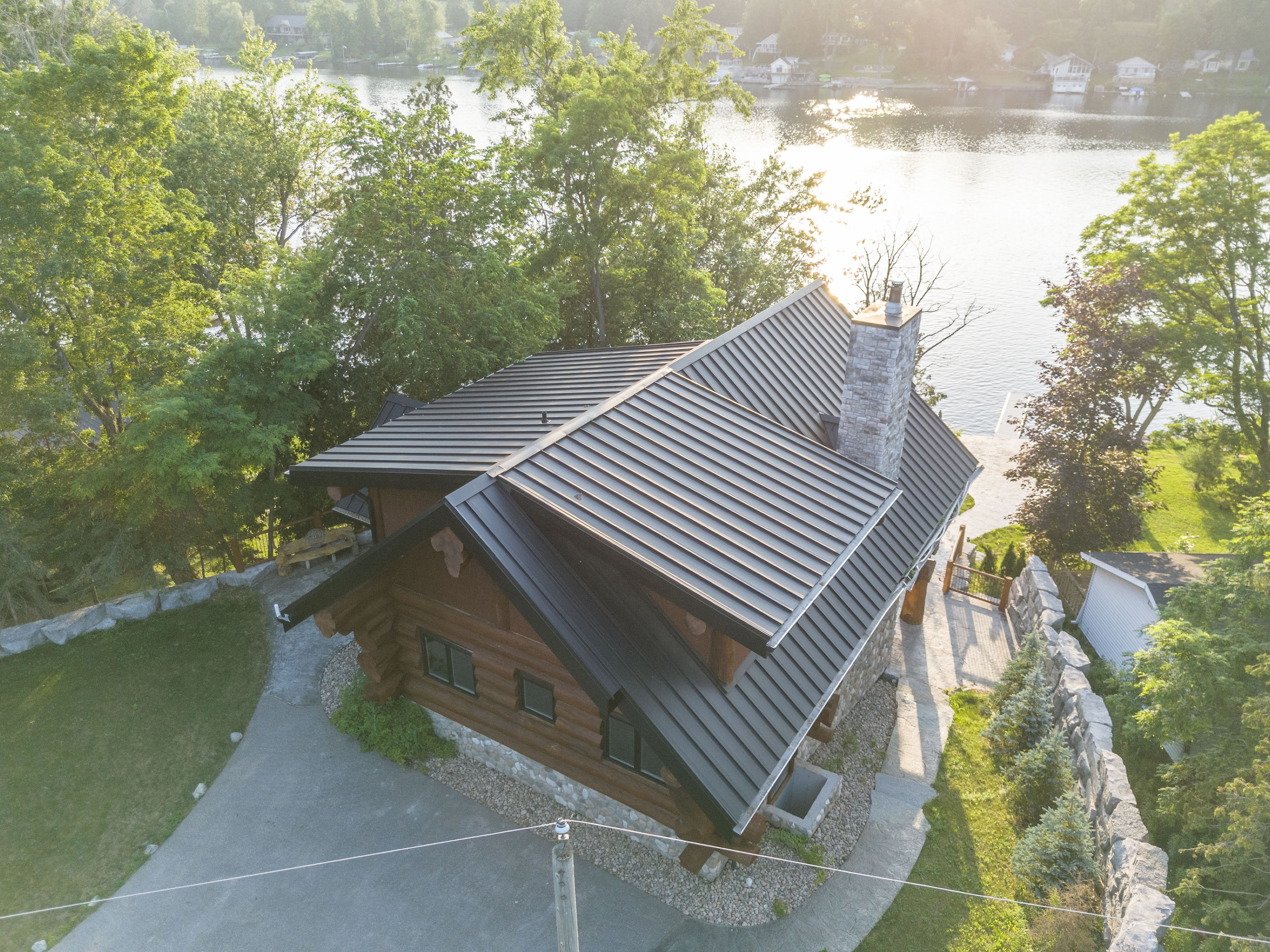 Elevated aerial view of Bear Lodge and its wooded setting