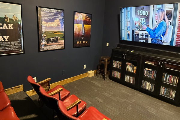Authentic 100-year-old theater seating meets modern entertainment. Whether it's a movie night on the big screen or a game of pool, there's space for everyone to play.