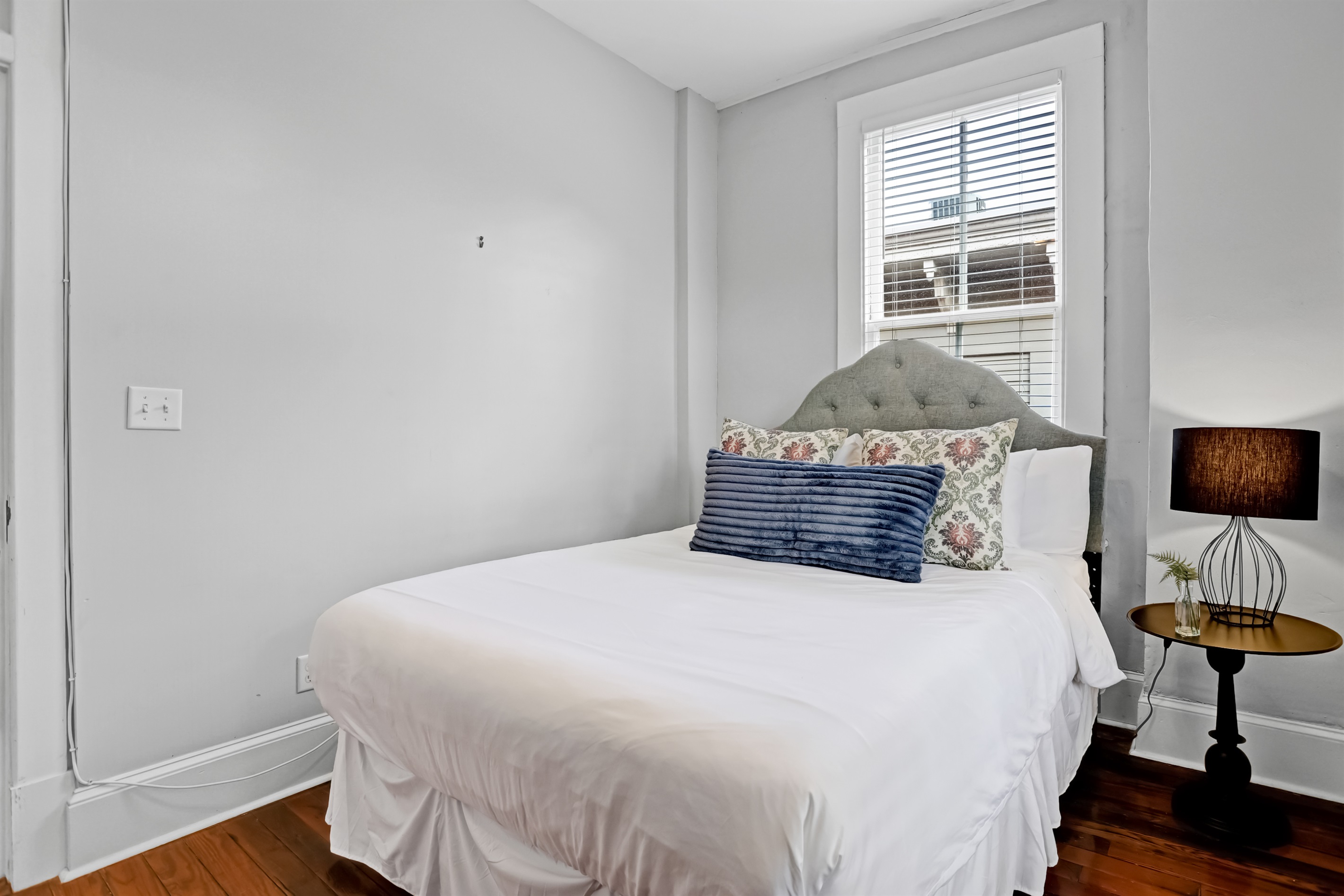 Comfort and convenience blend seamlessly in this charming bedroom retreat.