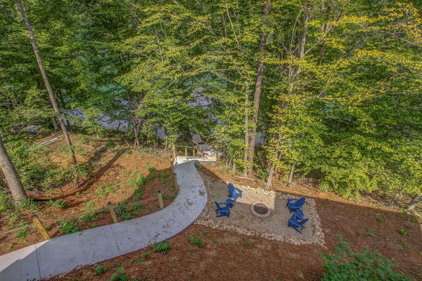 Fire pit seating area and pathway to lake