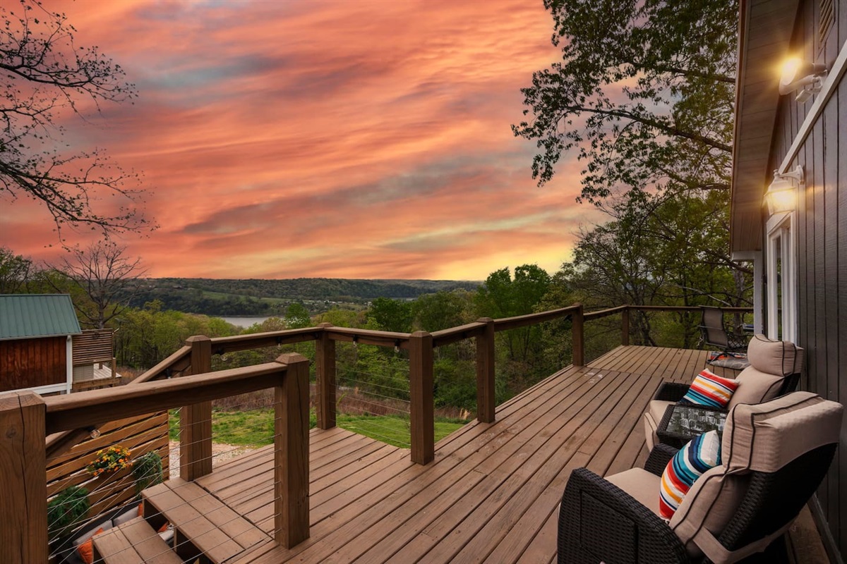 End your day with this peaceful, postcard-worthy sunset deck view. 