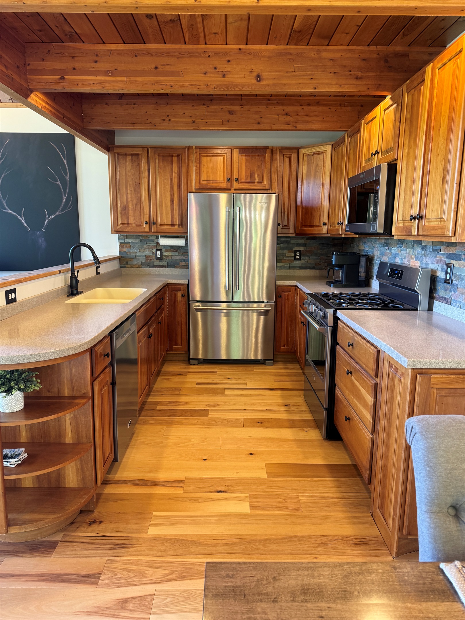 Renovated kitchen with stainless steel appliances