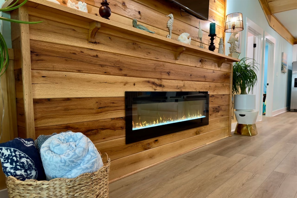 Our cozy, colorful room includes a fireplace for your comfort.