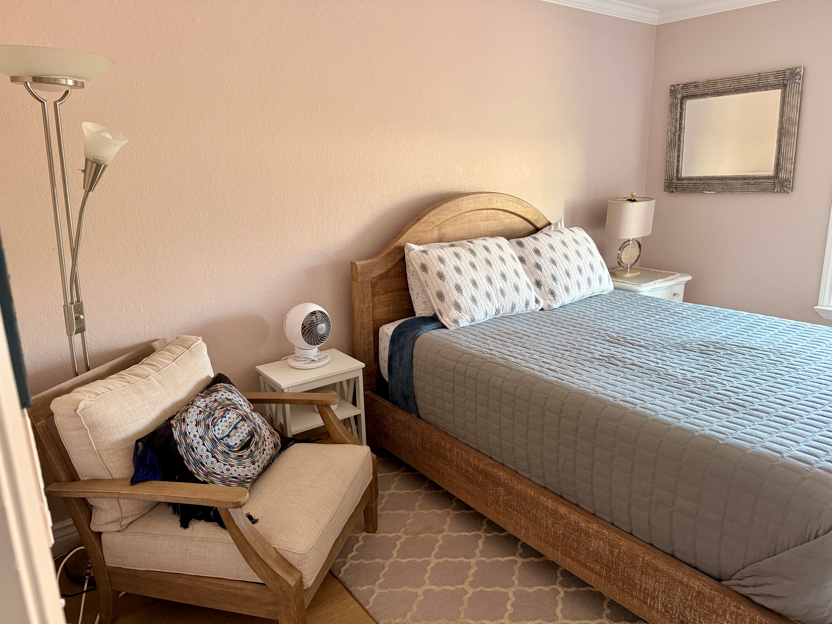 Second bedroom with comfy memory foam queen sized mattress. Super cozy chair great to curl up on with a good read.