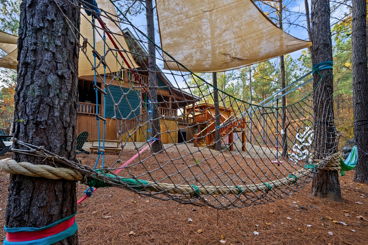 Another angle of the obstacle course shows off all the different ropes and platforms that kids love hopping across.