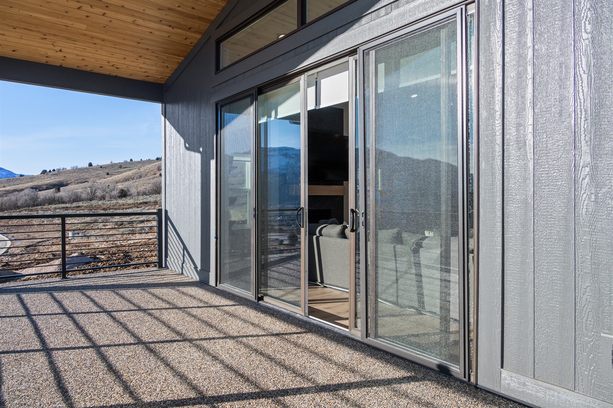 Upper balcony with sliding doors — take in sweeping valley sunsets.