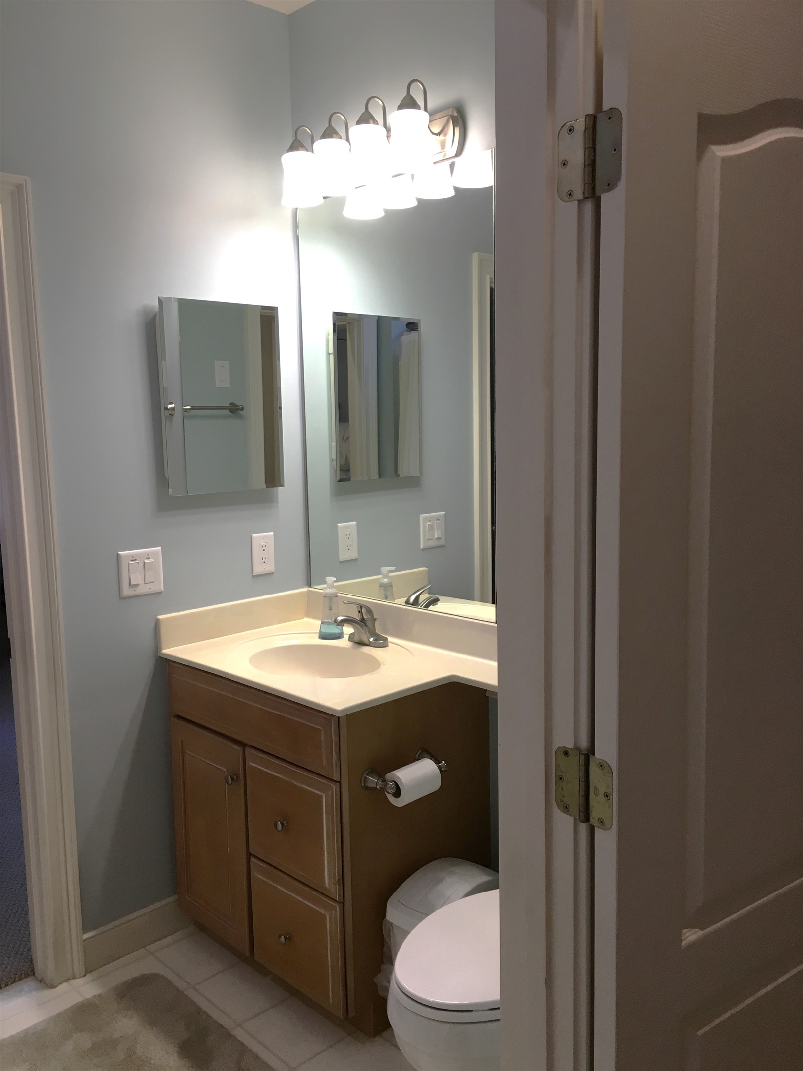 Hallway entrance to upstairs full bath