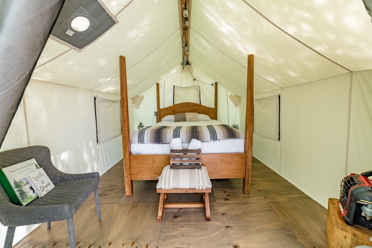 Queen bed inside of the tent