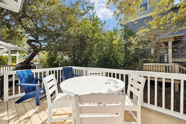 Backyard deck with outdoor dining seating