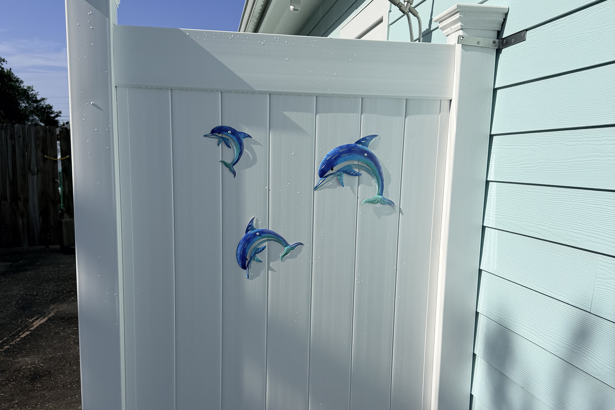 New shower stall with soap and shampoo.