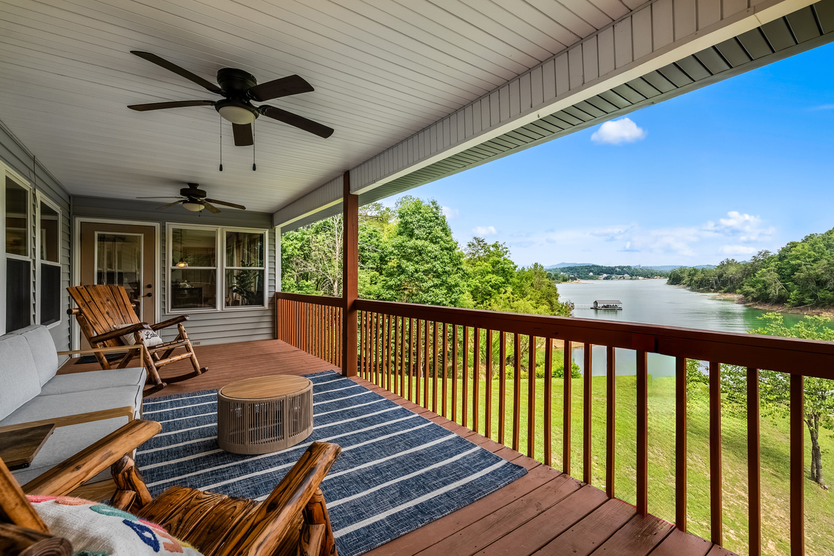 Views, fans and cozy seating from the top deck. Access through kitchen or master suite