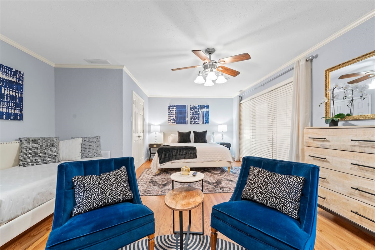 Ample space in the master! There is a king bed, a single bed, and a pack-n-play available for your use. A private full bathroom, smart TV, plenty of clothing storage, and a fireplace set the tone for a relaxing evening spent here! 