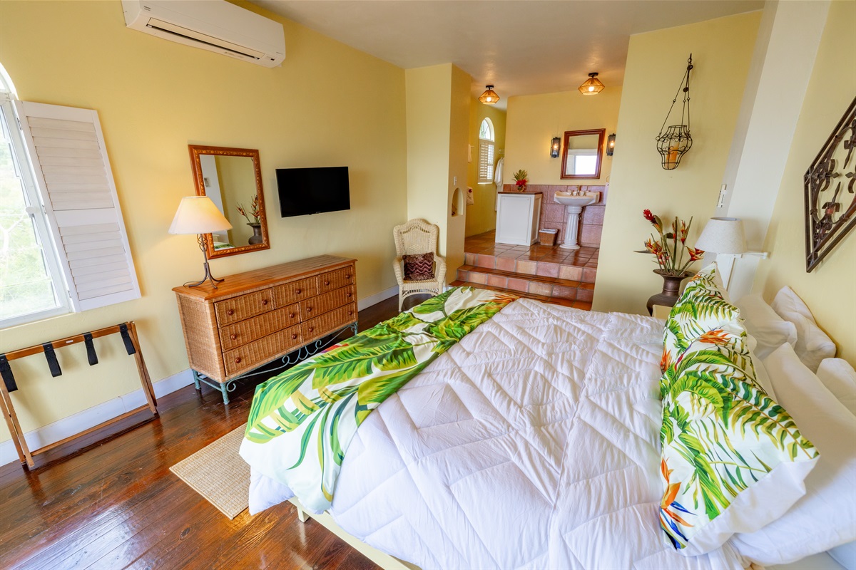 Guest suite 3 located a few steps down from the pool deck has private entrance