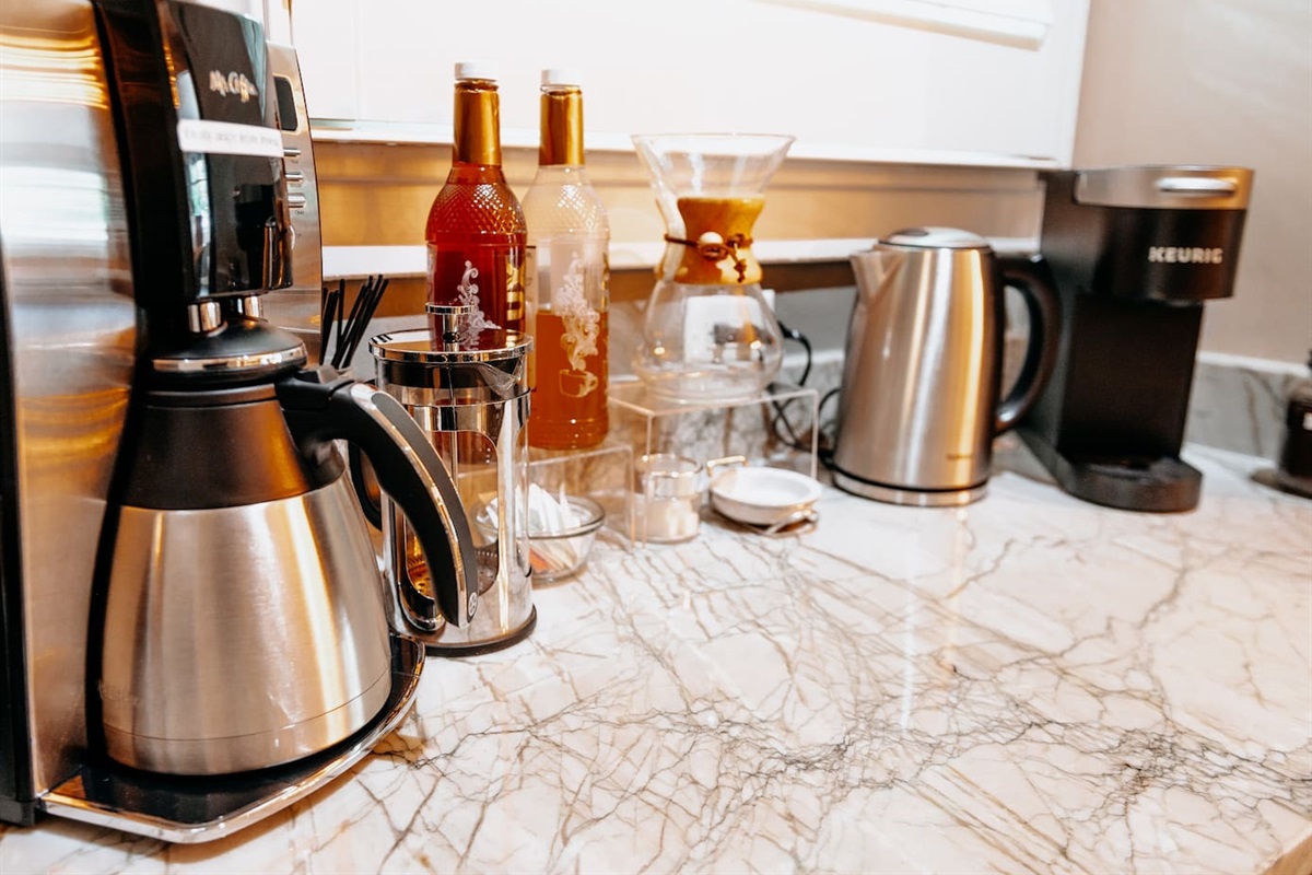 Coffee Lovers Dream! Four different types of brew. Drip, Chemex, French Press & Keurig. Mix-ins & frother  to top off your morning brew.  If nothing here is to your liking, Extra Fine,  a fabulous bakery and coffee shop is directly across the street.