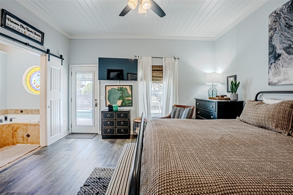 Master Bedroom with door to pool area