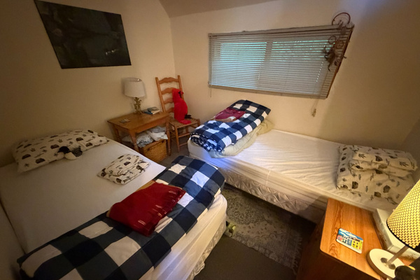 Main floor bedroom with single and double beds