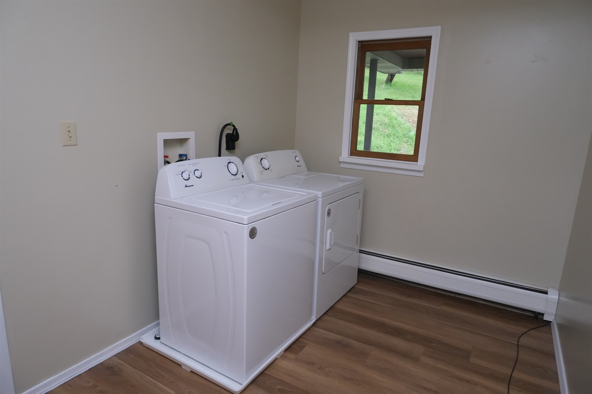 Laundry for guest use on Main Floor