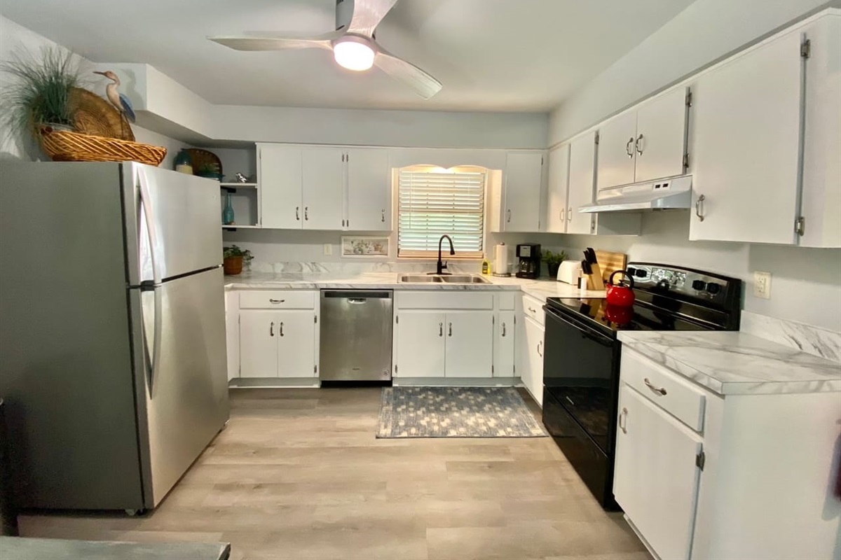 Spacious, well-equipped kitchen with all you need to prepare meals or snacks during your stay.  