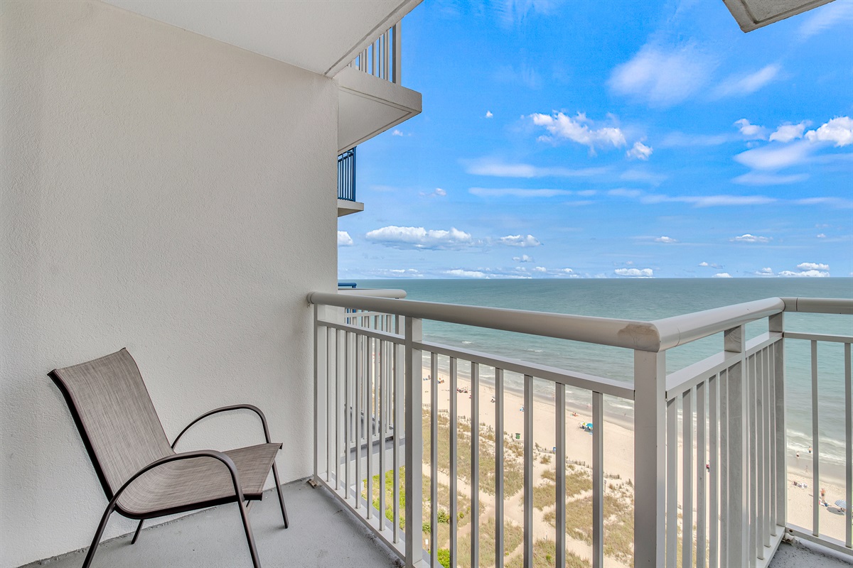 Sip your morning coffee with panoramic views in this balcony!