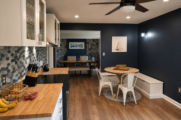 Open kitchen view toward the dining nook, creating an easy layout for meals, snacks and conversation.