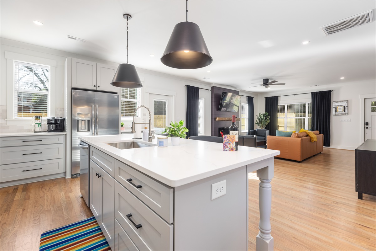 High ceilings and natural lights give an airy and free atmosphere to the open concept main floor living space. 