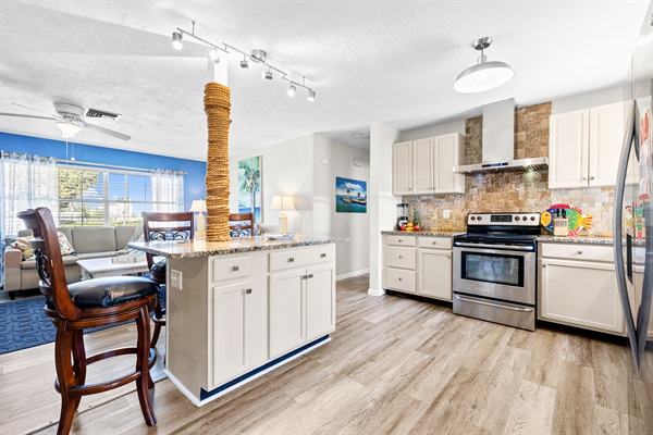 Kitchen with cookware, dishes and utensils for 10!   Kitchen includes coffee, paper towels and starter set of Dishwasher detergent.