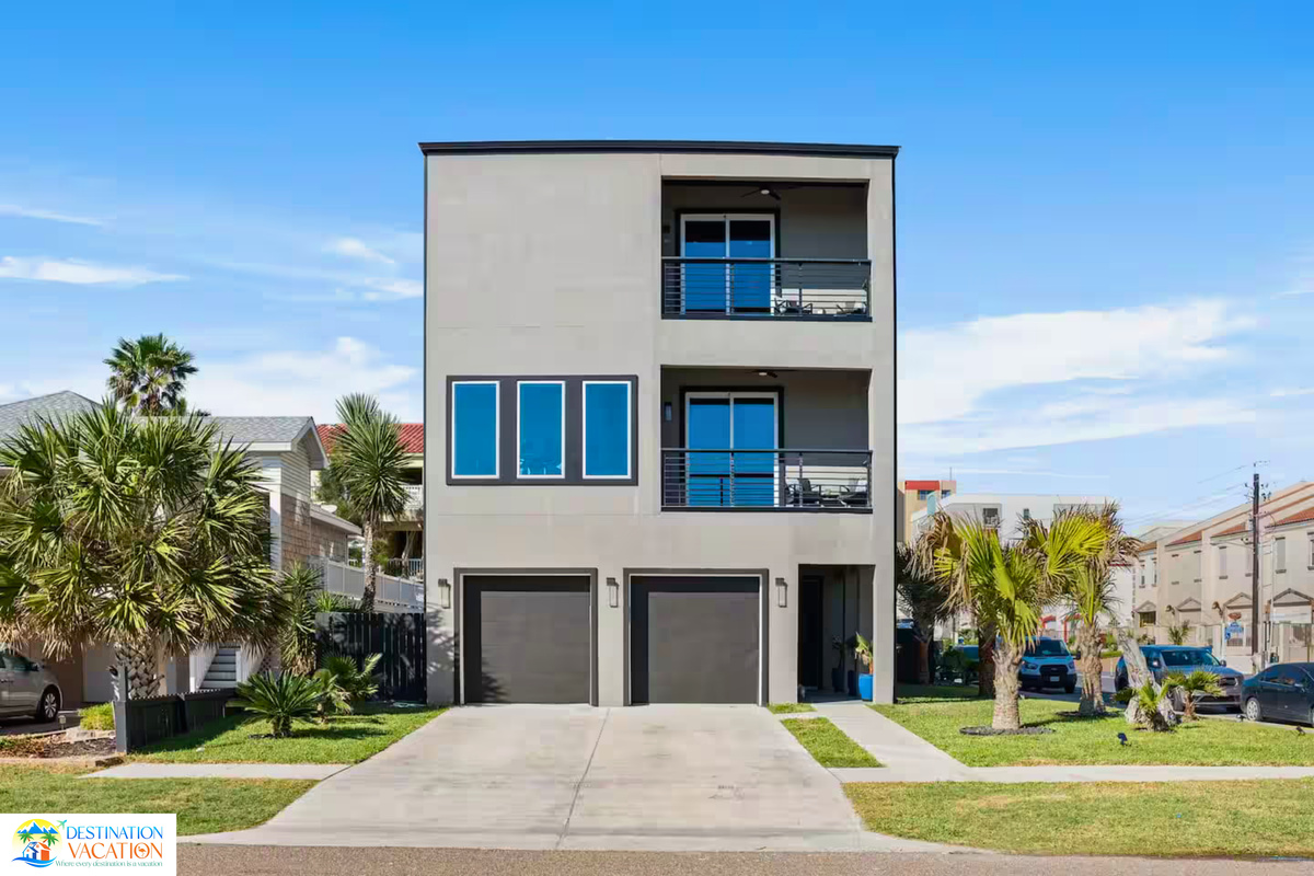 A sleek exterior surrounded by vibrant coastal charm.