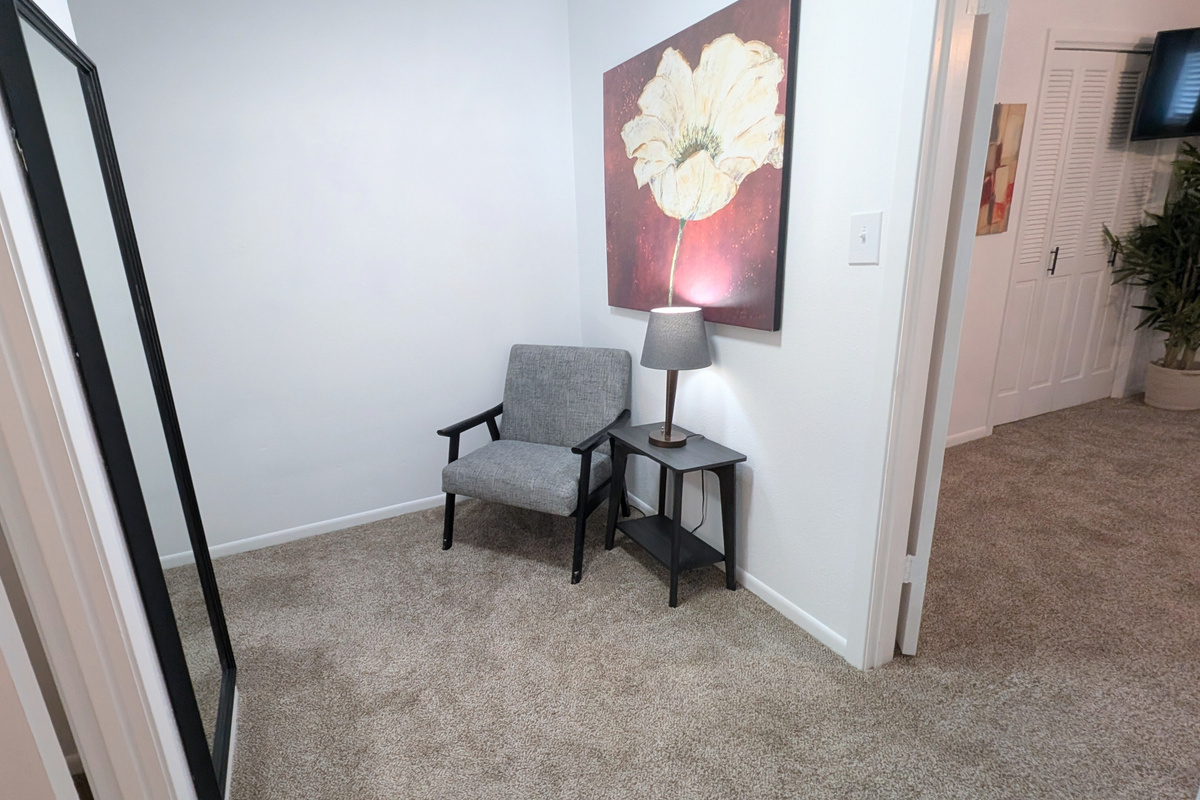 A full-length mirror on the landing adds convenience for getting ready.