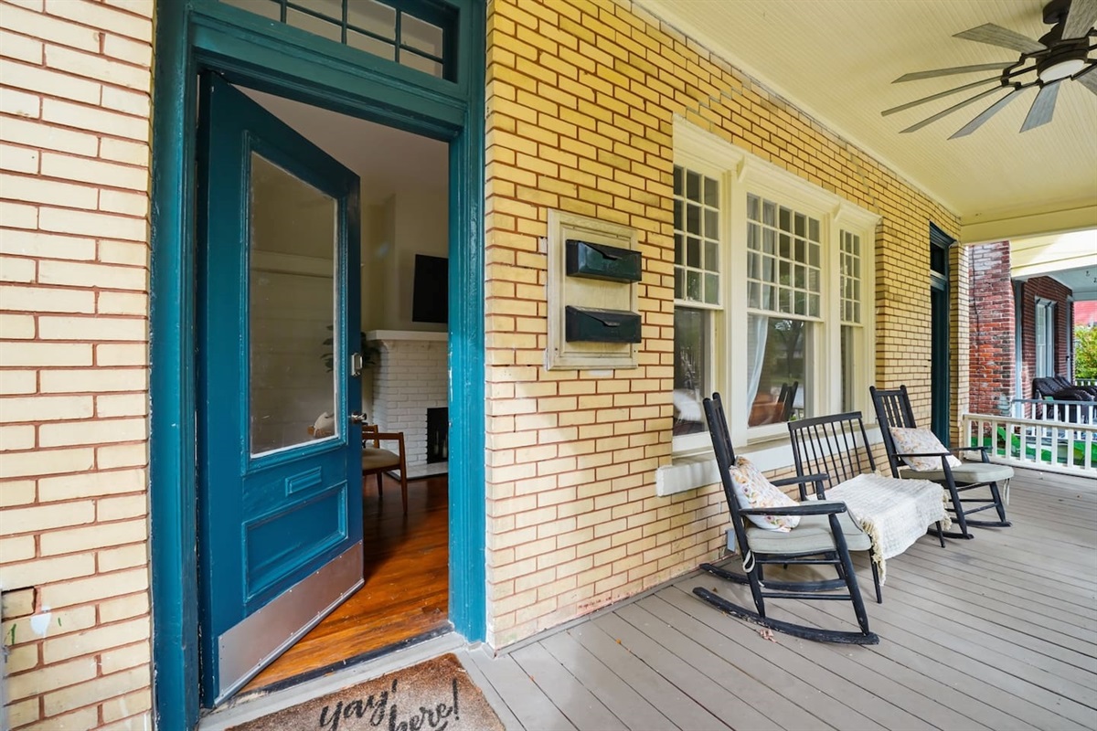 Entrance to the unit on the left side of duplex.  Front porch with 2 rocking chairs to relax