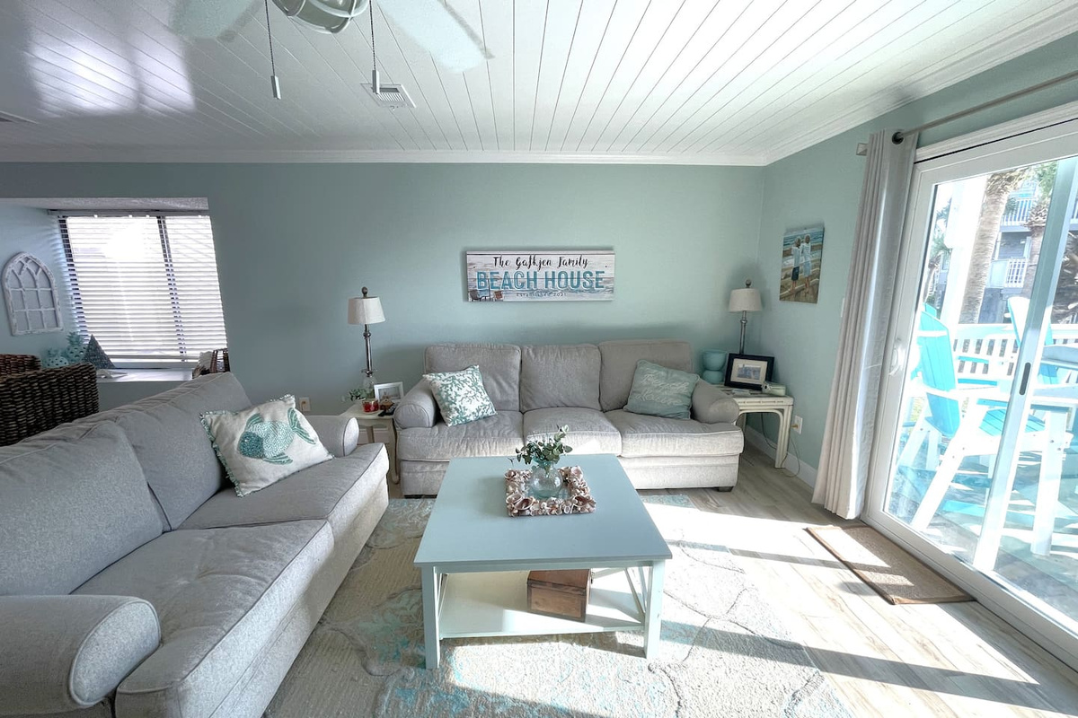 Step outside in two steps. Your living room opens directly onto the main deck with the Gulf right there &mdash; no transition, no hallway.