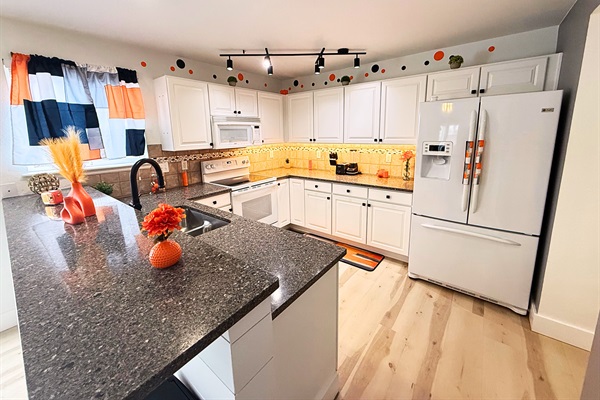 Chef’s Dream Kitchen – Cook with ease in our fully equipped kitchen, featuring modern appliances, ample counter space, and all the essentials to whip up a delicious meal.