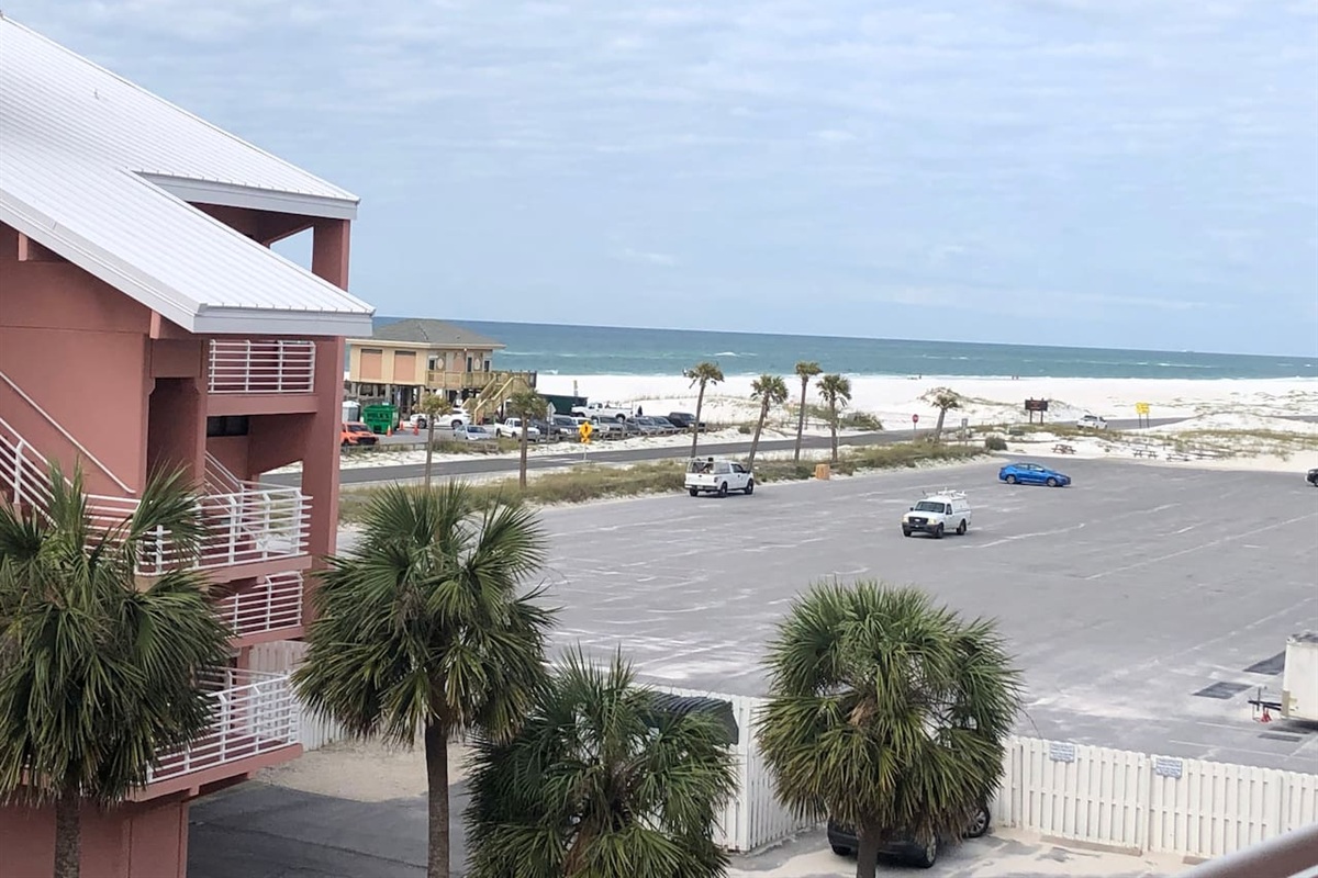 View of Gulf from the front door. Complex has been painted since this picture. 