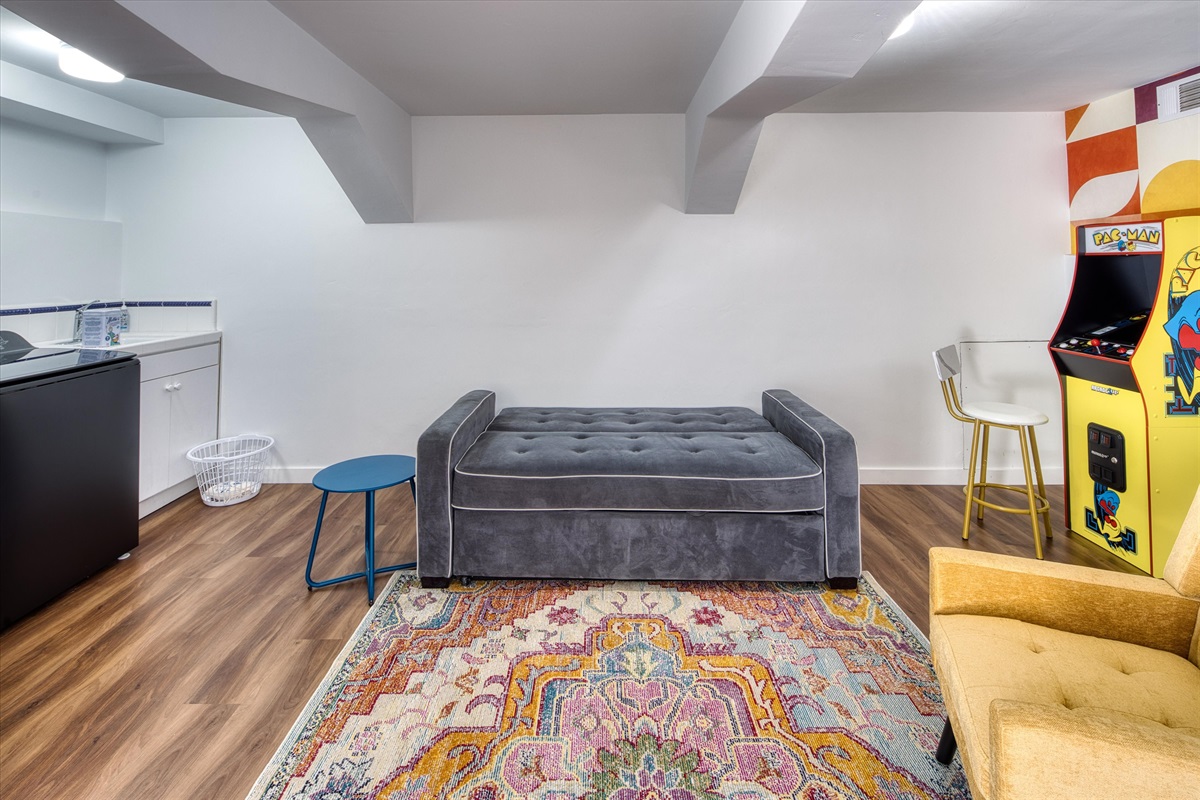 Couch that turns into a sofa bed in the game room