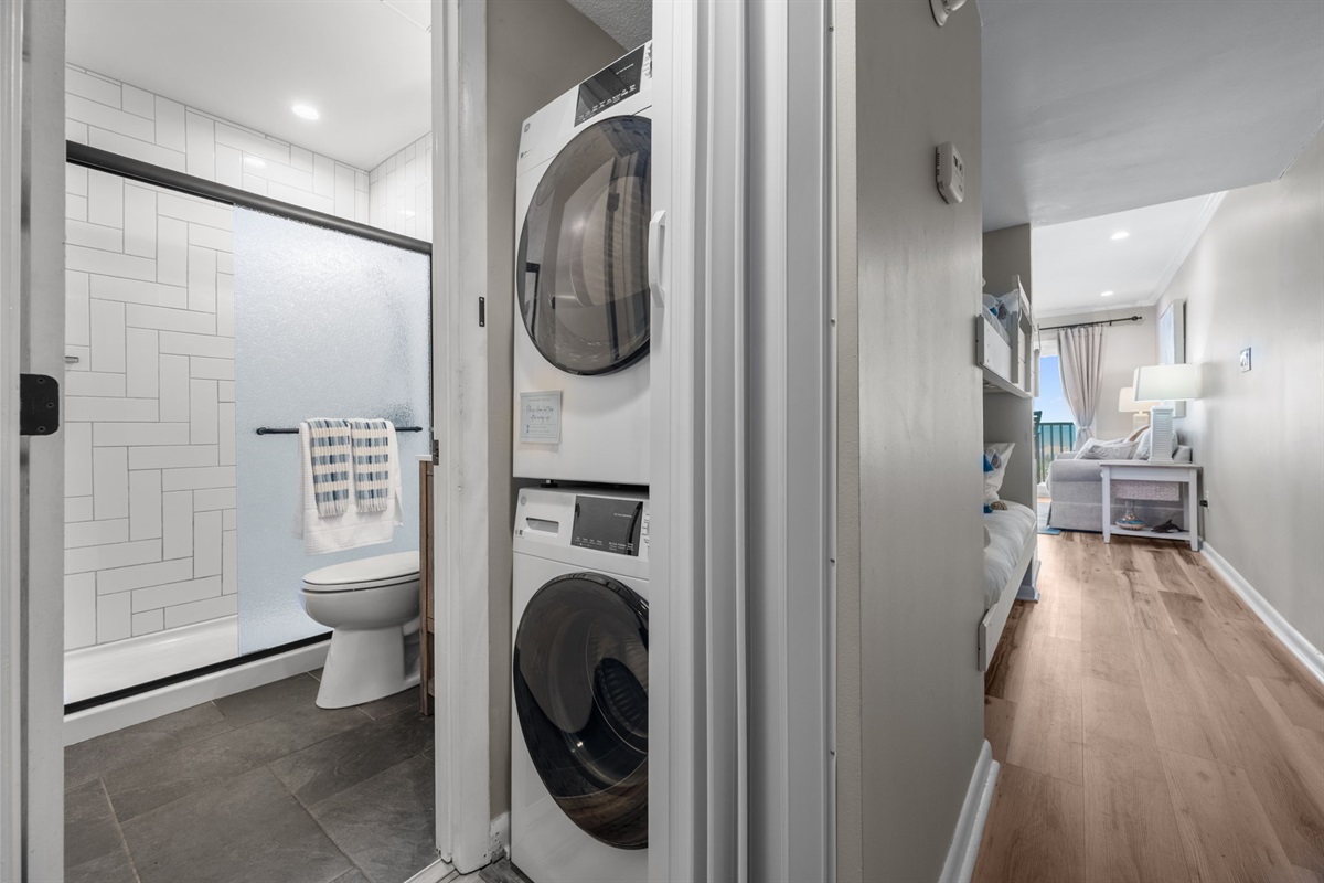 In-unit washer & dryer for easy stays&mdash;right next to the full bathroom