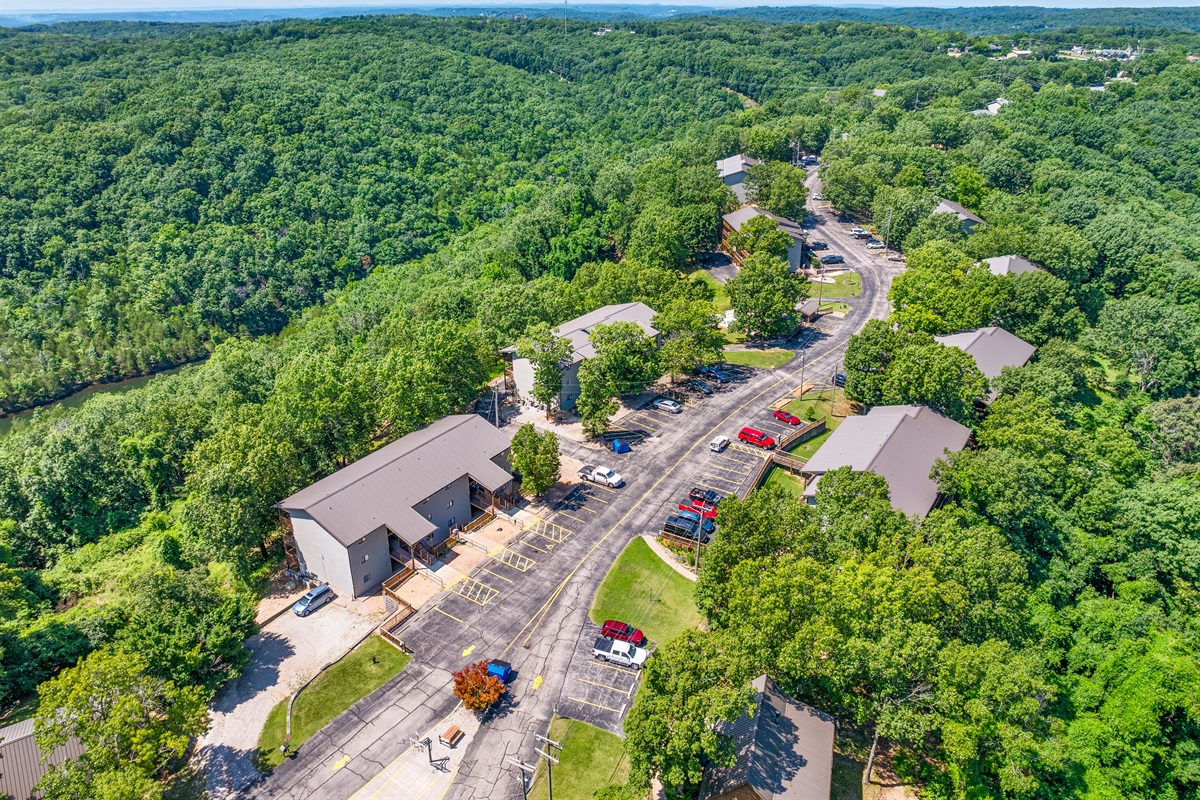 Top-floor, quiet, and surrounded by woods—this elevated setting feels removed from the crowds.