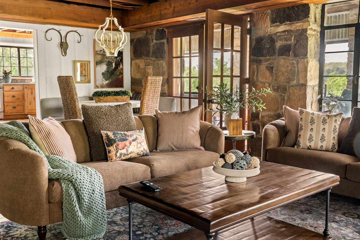 Comfortable seating and layered textures create the perfect place to unwind.