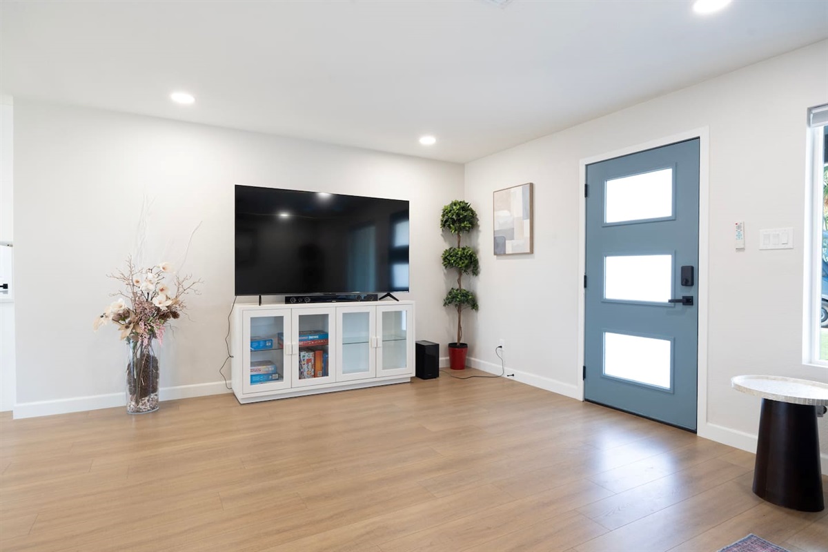 Spacious living area with large smart TV—perfect for movie nights and relaxing after a day exploring Scottsdale