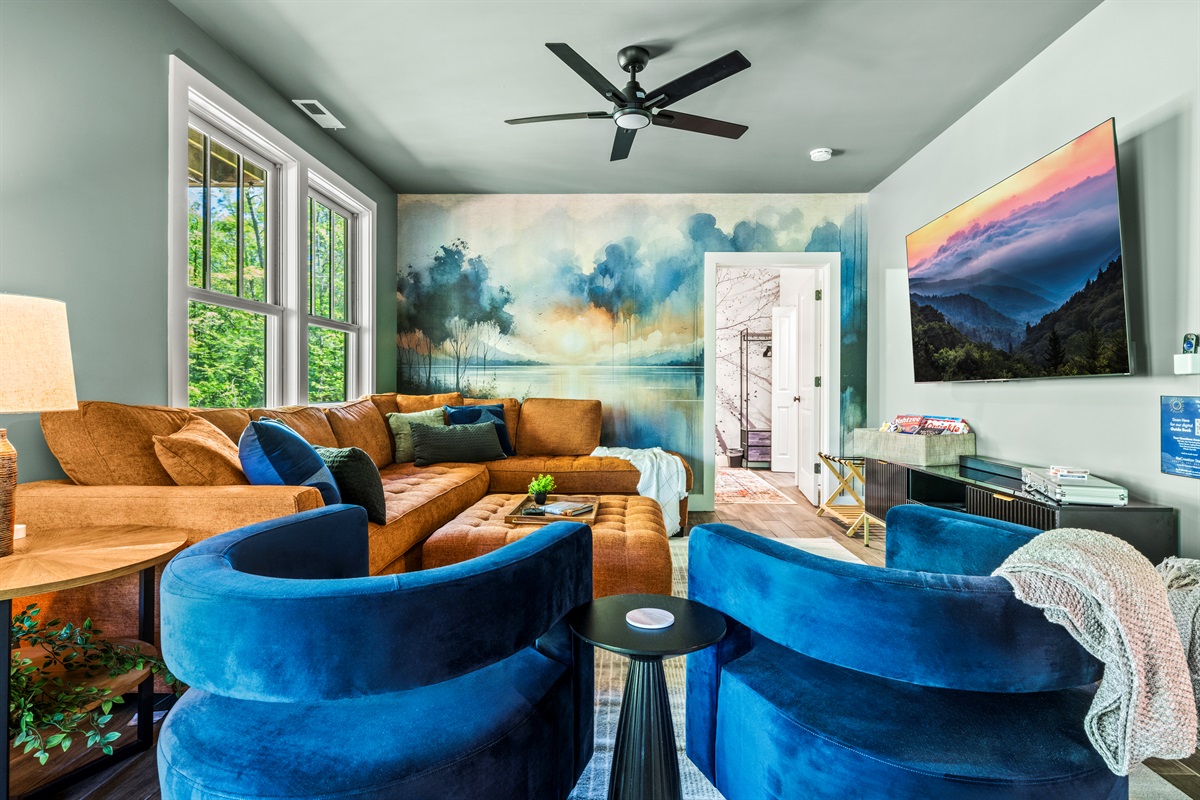 Kick back on the massive sectional and stream your favorite shows on a 75" smart TV and sound system —perfect for movie nights after a day of mountain adventures.