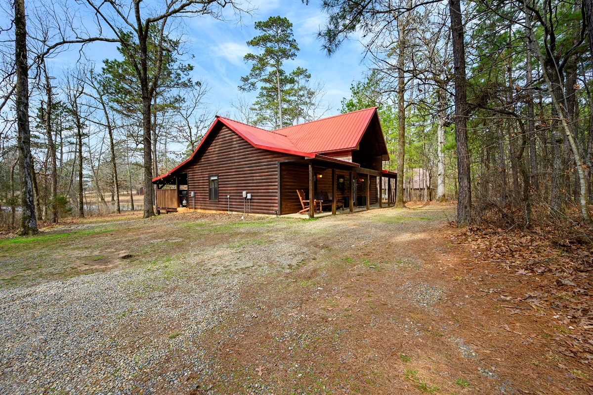 A refined woodland retreat with generous outdoor space and easy access. Designed for comfort and privacy, this cabin blends rustic architecture with upscale finishes for a polished first impression.