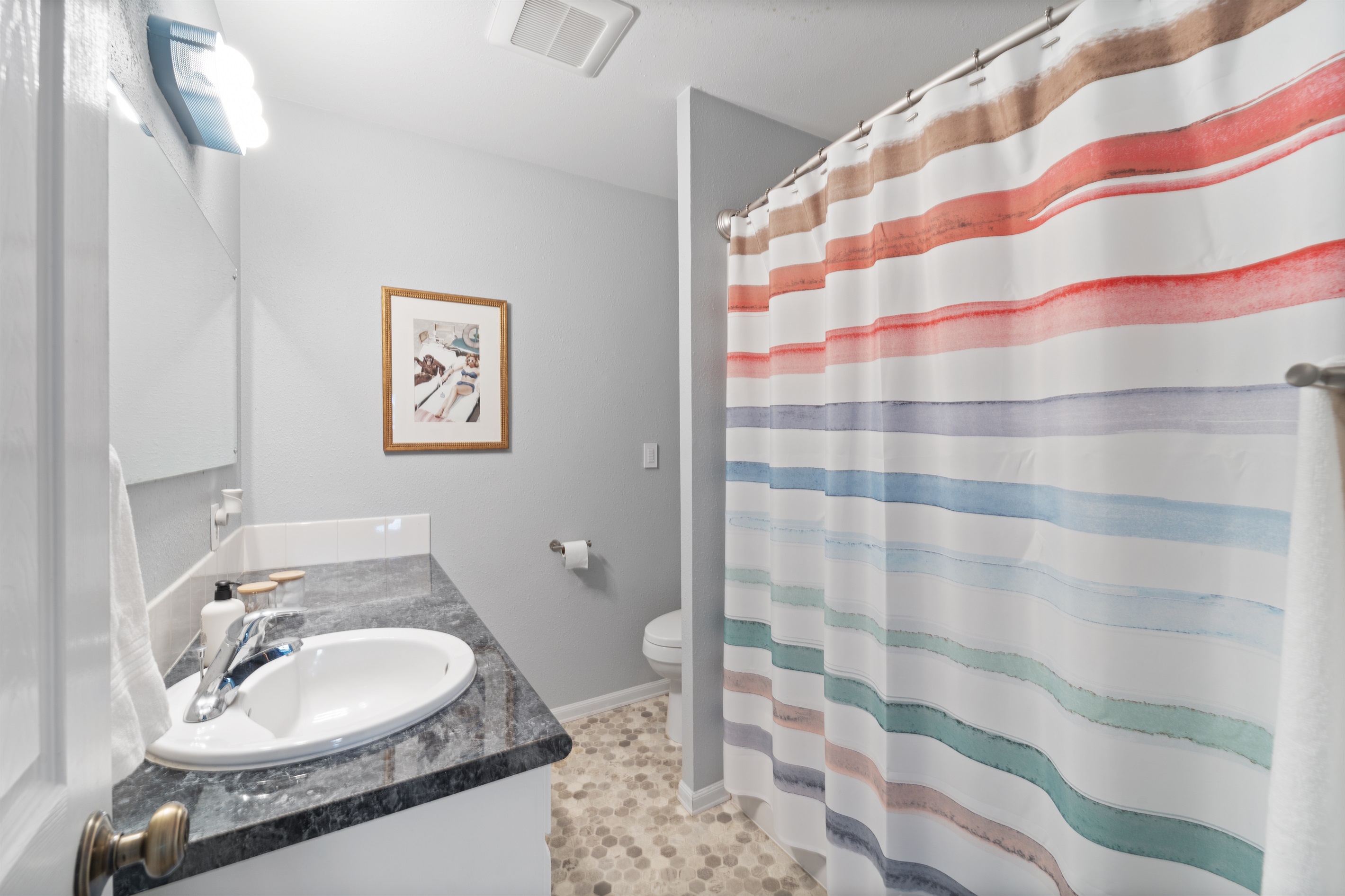 Bathroom w/Tub and Shower, main floor. 