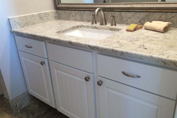 Master bathroom with shower/tub combination 