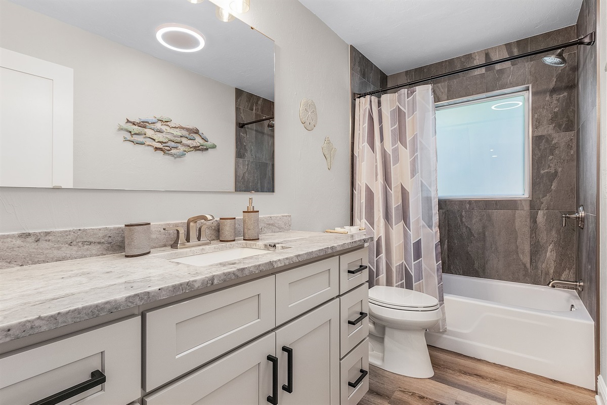 Main Bathroom- located next to the 2 Full beds