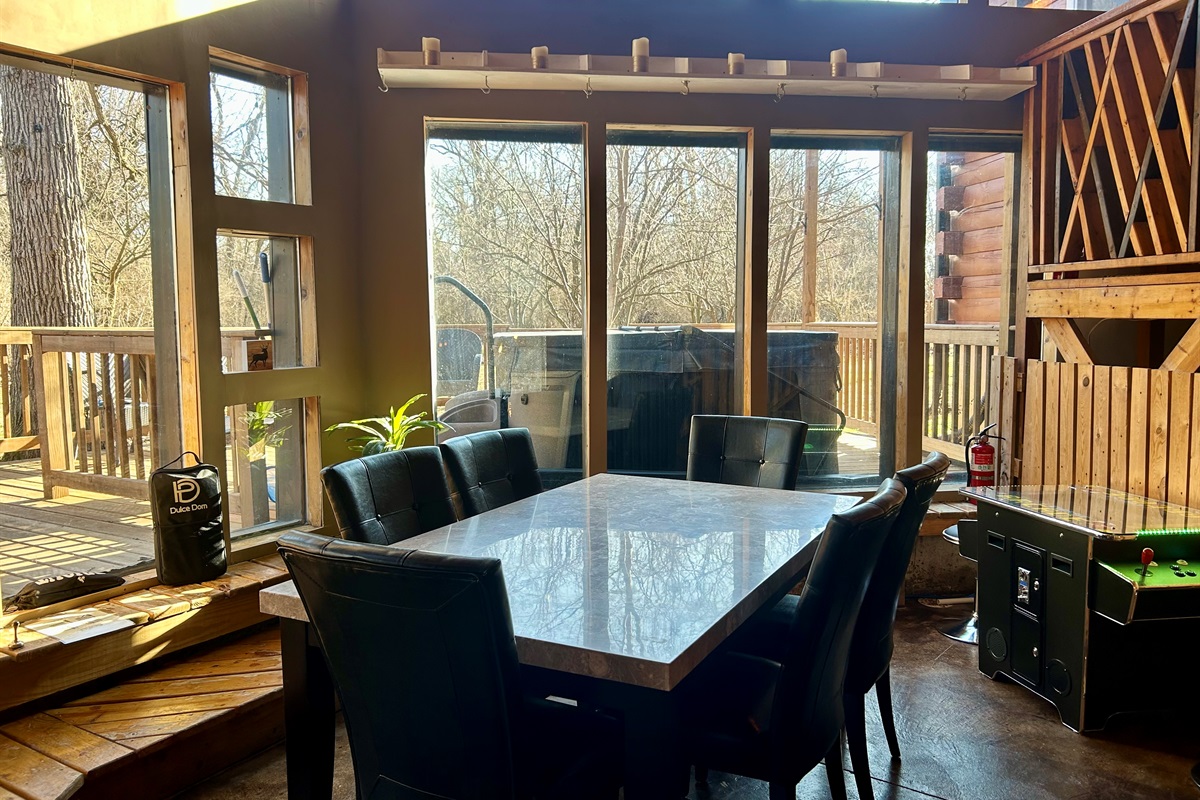 Climate controlled area for playing games and viewing local wildlife in the back yard. 