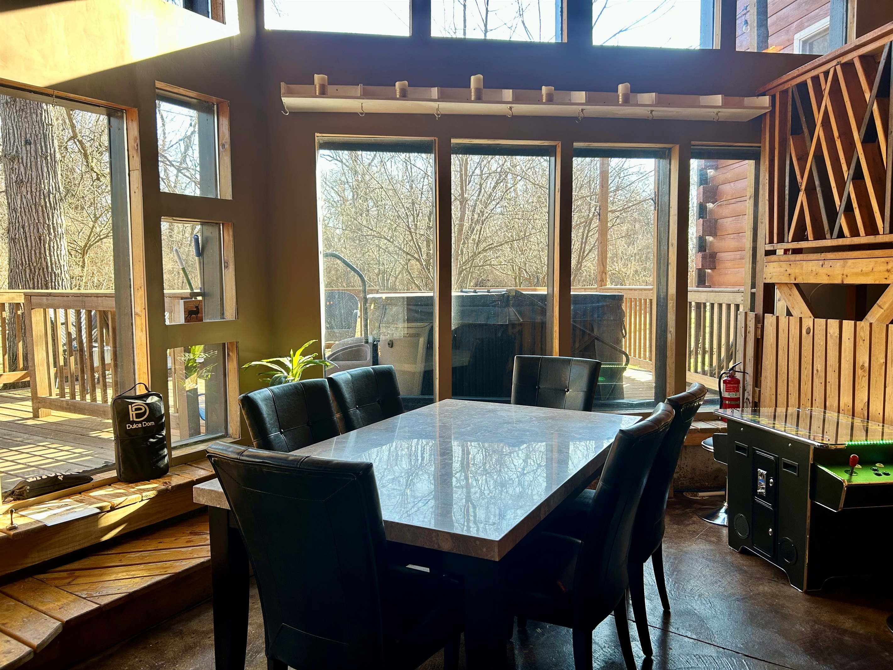 Climate controlled area for playing games and viewing local wildlife in the back yard. 