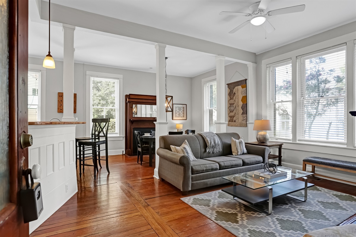 Step through the front door into a warm, inviting living space filled with natural light.